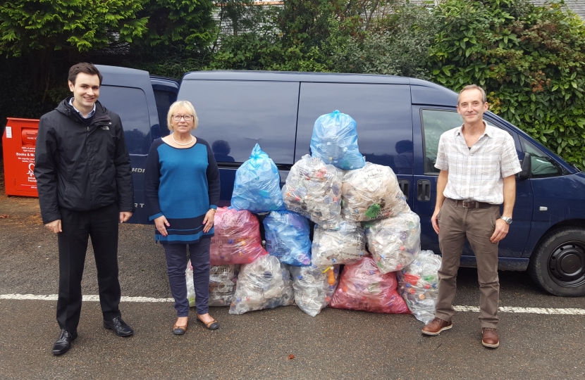 L2R – Sheryll’s Caseworker Nick Craker, Sheryll Murray MP and Robert Arnold with the plastic bottles Mr Arnold had collected.